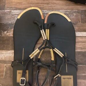 Dolce Vita! Chic Black and Gold Sandals